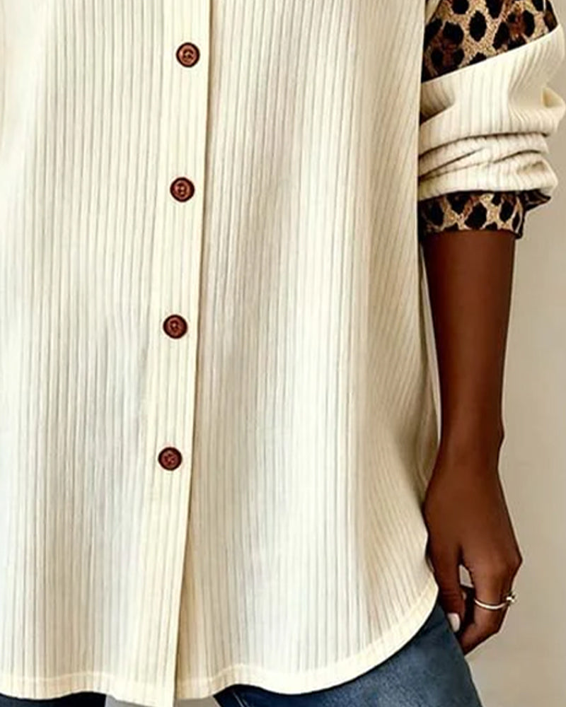 Liora | Skjorta med knappar och djärvt leopardmönster